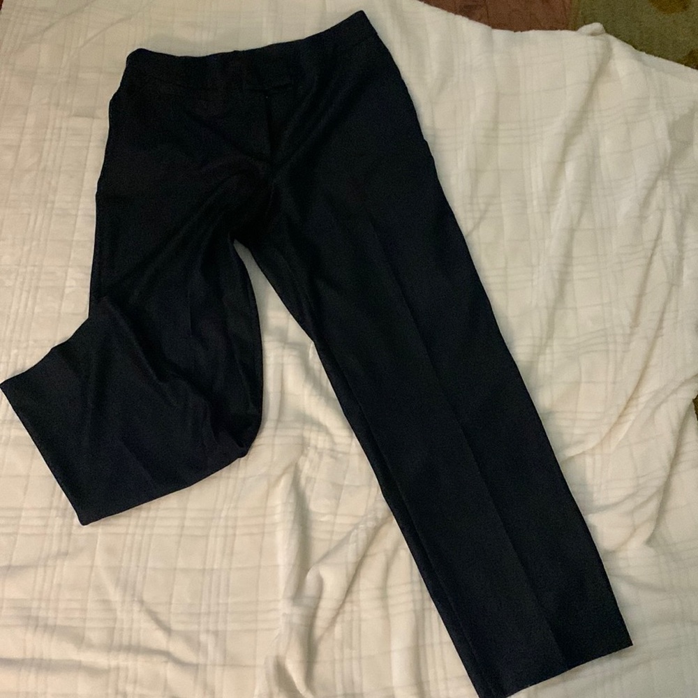 Dark denim colored dress slacks.